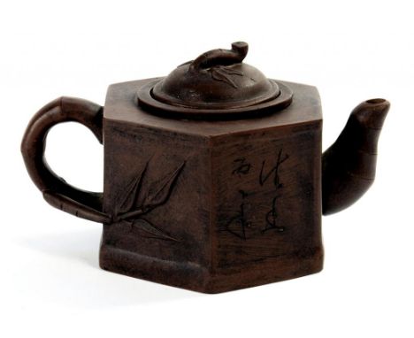 AN YIXING STONEWARE HEXAGONAL TEAPOT, INFUSER WITH COVER,  WITH BAMBOO SHAPE, HANDLE, SPOUT AND FINIAL, INCISED WITH CALLIGRA