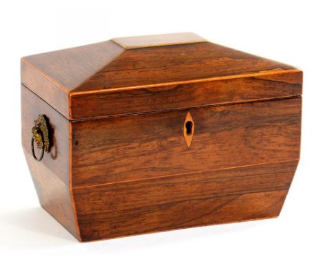 AN EARLY VICTORIAN ROSEWOOD AND LINE INLAID TEA CADDY, THE DIVIDED INTERIOR RETAINING THE PAIR OF COVERS, EMBOSSED BRASS HAND