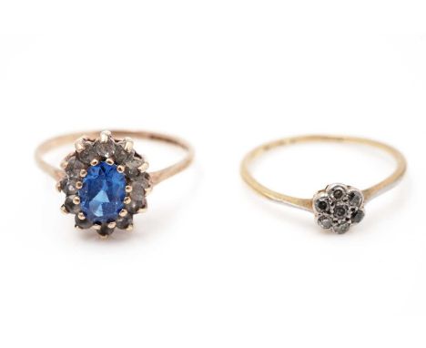 A diamond cluster ring, on gold mount, and a blue and white stone ring. (2)