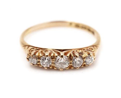 A five stone diamond ring, the brilliant cut diamond weighing a total of approximately 0.50carats, in 18ct yellow gold scroll