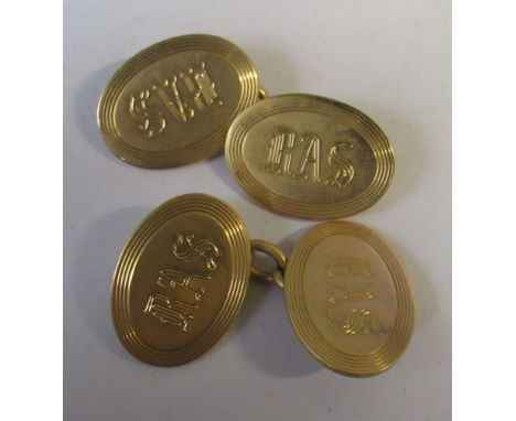A pair of 18ct gold cuff links, the oval terminals engraved initials 'R A S', 11.8g&nbsp;