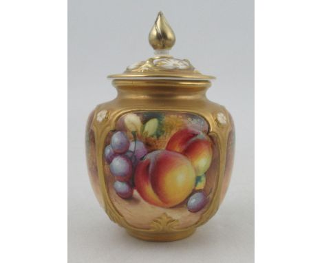 A Royal Worcester covered vase, decorated half round with fruit to a mossy background by Roberts, shape number H162, height 4