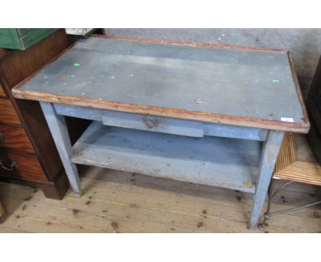 An early 20th century zinc or tin topped garden table, fitted with a drawer and shelf below, 42.5ins x 25ins x 28ins&nbsp;