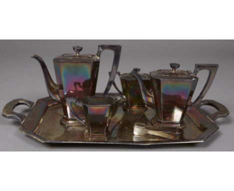 K. Uyeda sterling silver tea set comprised of one teapot, one coffee pot, one creamer, one sugar bowl, one pair of tongs, and