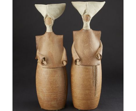 Joel Edwards. Pair of ceramic nun figurines. Signed along the base.Note: Portion of the proceeds from this lot will be donate