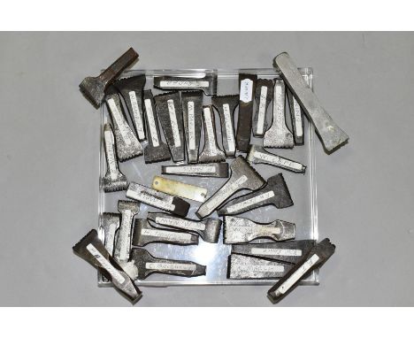 A BOX CONTAINING TWENTY NINE CARPENTERS PERSONAL TOOL STAMPS, all made from cast iron with names tooled into one end with nam