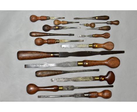 A BOX CONTAINING SEVENTEEN VINTAGE SCREWDRIVERS, including a 20 inch long London Pattern screwdriver by Thomas Turner, a simi