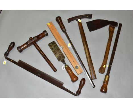 EIGHT ITEMS OF LARGE VINTAGE TOOLS including an Isaac Grieves draw knife with an 18'' edge, a Gilpin axe with a 13'' head and