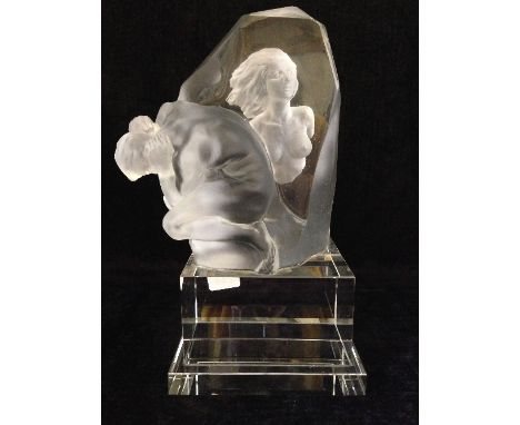 A massive 'Lalique' STYLE glass sculpture modelled as a naked male figure in front of a portrait of a naked female figure wit