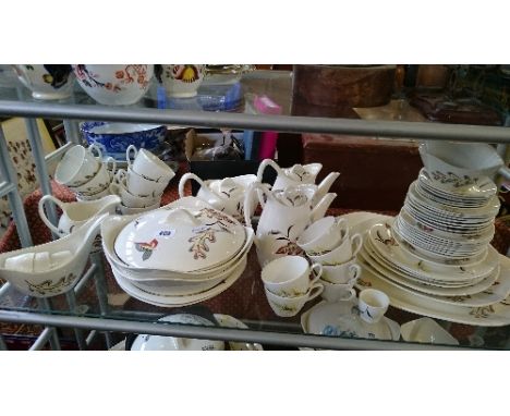 The residue of an extensive Midwinter Stylecraft china dinner and tea service decorated in the Falling Leaves pattern (a lot)
