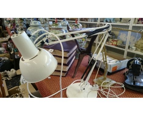 A large modern white painted angle poise lamp (WL2).