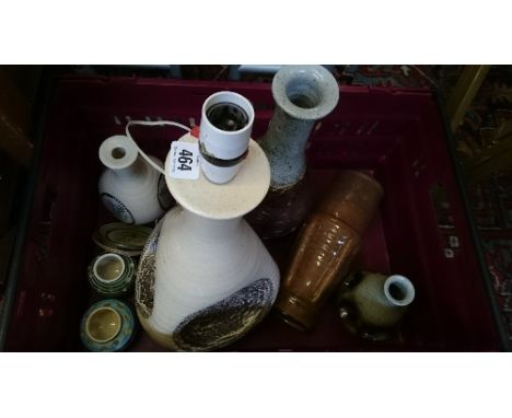 A box containing a quantity of various Purbeck Pottery items including lamp bases and vases.