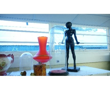 A collection of various items including two glass domes, plaster figure, tea caddy and other items.