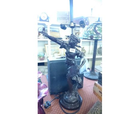 A heavy cast iron lamp base modelled as a Classical Female figure.