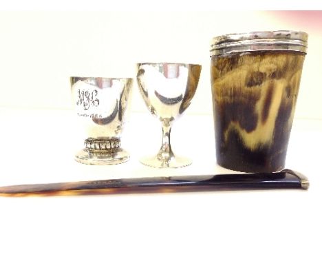 A small silver tot together with a silver egg cup, silver lined horn beaker and early 20th century silver mounted tortoiseshe