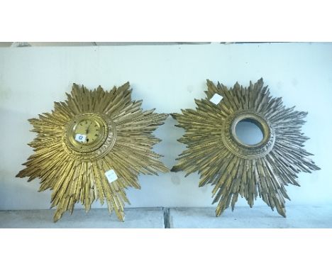 Two early 20th century gilt wood large Sunburst clock frames (one with movement missing).