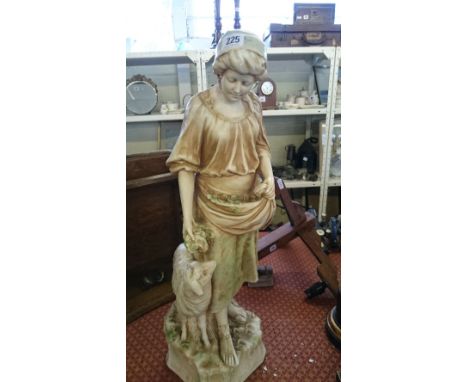An early 20th century plaster figural lamp base modelled as a Shepherdess (restored).