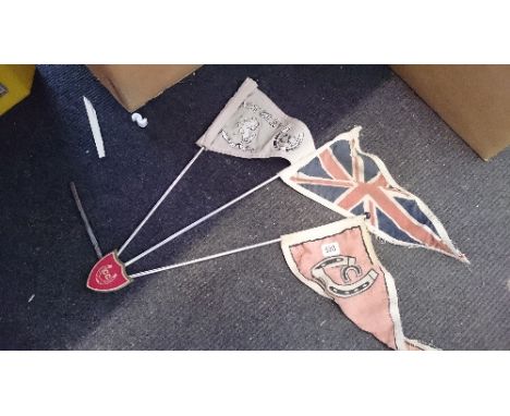 Three automobile bonnet pennants.