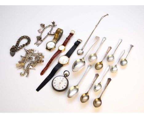 A small collection of silver, jewellery and watches, comprising; a silver bracelet with attached charms, a white metal curb l