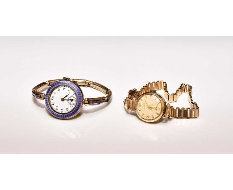 A 9ct gold Smiths Astral bracelet watch, the circular dial with batons and subsidiary seconds dial, stamped 9ct inside case b