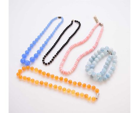 A collection of fifteen bead necklaces, to include; a graduated malachite example, a cherry red necklace, a dyed jade example