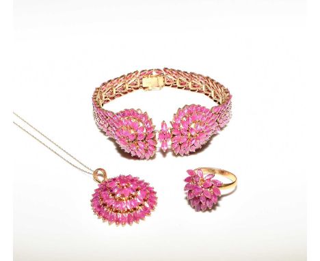 A suite of untested ruby set jewellery, comprising; a circular cluster pendant on chain, a double stylised heart shaped clust
