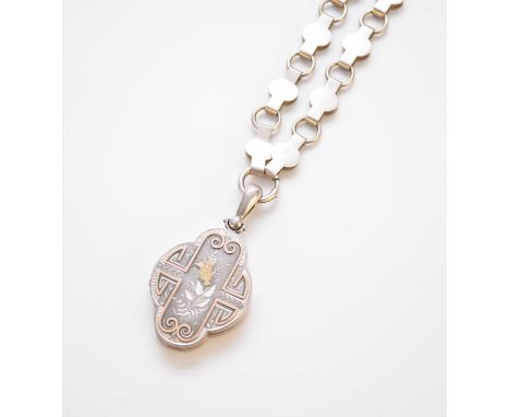 A Victorian Aesthetic movement quatrefoil pendant suspended from decorative link chain, the lobed pendant with bright cut eng