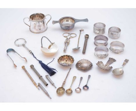 A small collection of silver and bijouterie, comprising; a small two handled silver bowl, a silver leaf form caddy spoon, a p