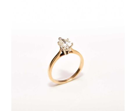 A single stone pear cut diamond ring, claw set in white metal to yellow metal shank, stamped ‘14k’, ring size N, weight appro