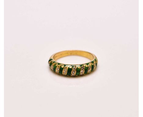 A French diamond and green enamel ring, the tapering band set with graduated diamond set scrolls to green enamel ground, ring