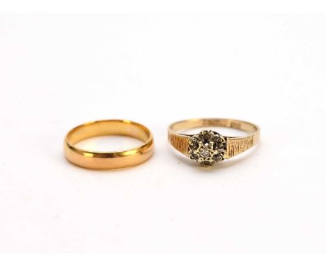 A 22ct gold wedding band, size K 1/2, weight approx 2.9g, together with a 9ct gold diamond floral cluster ring, size O, weigh