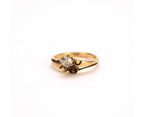 An old cut diamond crossover ring, the single old cut diamond claw set to crossover yellow metal mount, one stone missing, th