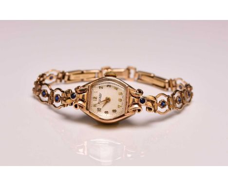 Rotary: A lady's 9ct gold bracelet wristwatchDate: Circa 1954Movement: Cal.955 15-jewel, manualDial: Silver matte, gold Arabi