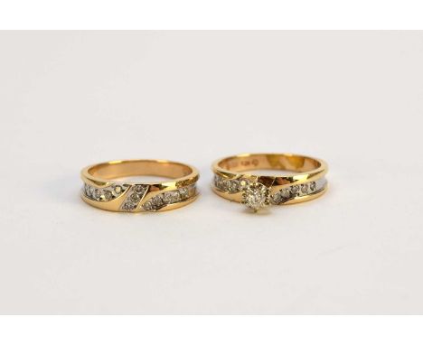 A single stone diamond ring with diamond set shoulders, together with a diamond set yellow and white metal band, both stamped