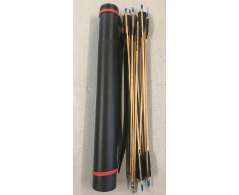 A set of 12 handmade wooden 26" steel-tipped arrows with black fletchings.In a black plastic arrow case with red trim.