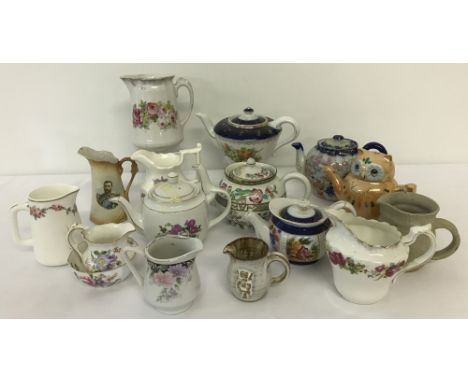 A box of assorted vintage and Victorian ceramic miniature teapots and jugs.To include: Crown Derby "Derby Posies", Indian Tre