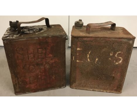 2 vintage 2 gallon petrol cans with screw top lids.A 1949 Shell can together with one other.
