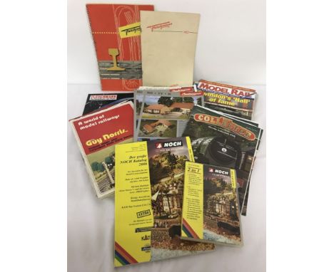 A collection of vintage and modern model railway books, catalogues and magazines.To include a vintage Fleischmann track layou