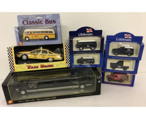 8 boxed mixed diecast cars.Comprising: 5 RNLI vehicles, a New York taxi, vintage Malta bus and a Lincoln Limousine.