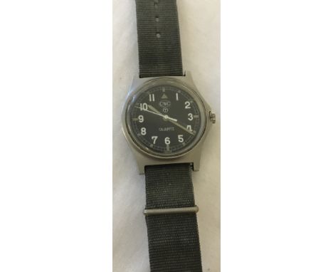 CWC military issue quartz wristwatch, 1984, on original canvas strap, in working order.Marked with military arrow mark and nu