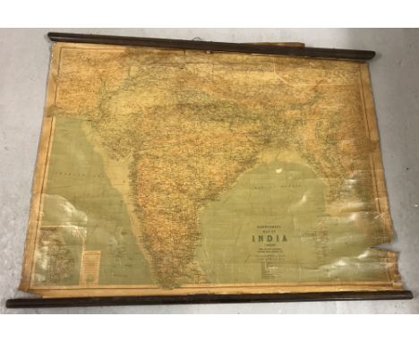 A vintage hall hanging canvas map of India.some age related damage to top.Approx. 80cm x 101cm.