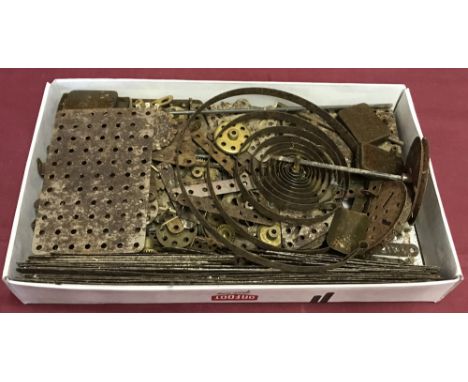 A box of vintage Meccano.To include plates, wheels, cogs and cuts and bolts.