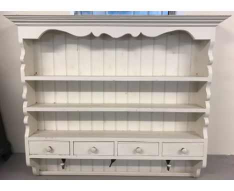 A large white painted pine wall hanging shelf.Two shelves with 4 small drawers. Drawers have crackle glaze ceramic bun handle