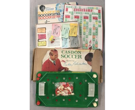 A vintage boxed Casdon Soccer Bobby Charlton game.Together with a boxed Alan Ball Soccerama game. Both boxes in play worn con