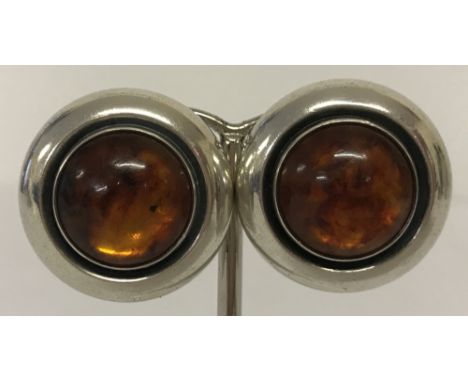 A pair of vintage amber and Danish silver, circular clip on earrings by designer Niels Erik From.Makers mark and '925 sterlin