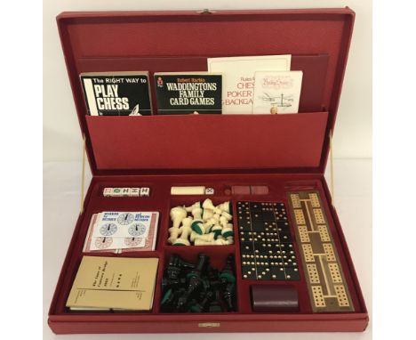 A complete vintage Waddington's Games Compendium for adults.To include: instruction books, card games, chess pieces, Poker di