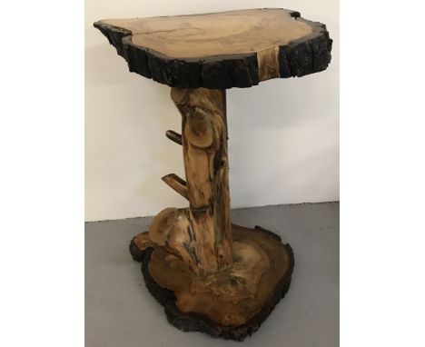 A bespoke handmade rustic natural wood high console table.Horse chestnut top and base complete with bark on a tree trunk pede