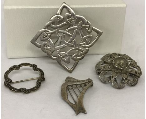 A large silver Celtic knot brooch hallmarked London 1995.Together with a silver Celtic harp brooch marked 925 with maker init