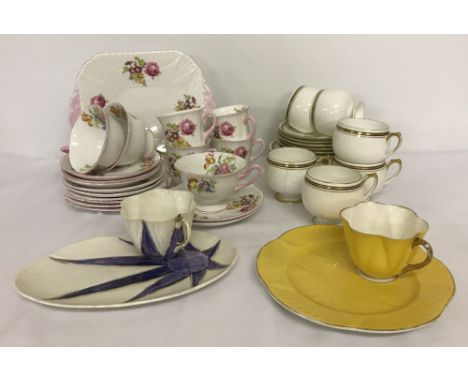 A collection of vintage Shelley tea ware.To include 2 part tea sets; one floral set of 3 teacups, 4 coffee cups, 7 saucers, s