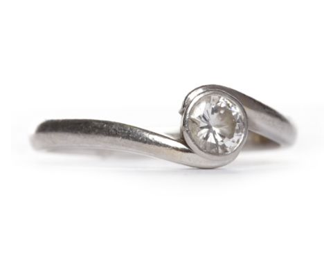 PLATINUM DIAMOND SOLITAIRE RINGthe collet set round brilliant cut diamond of approximately 0.25 carats in a twist setting, si